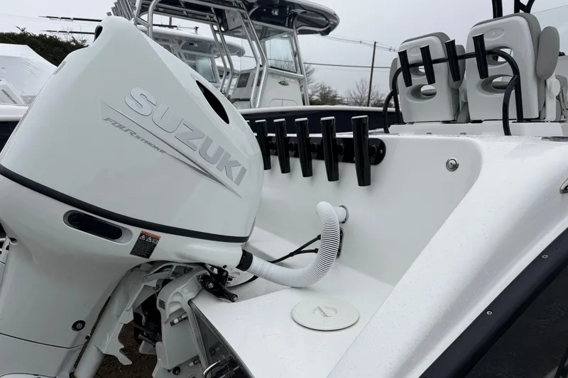 Slide: The Image of 2026 Cape Horn 22 OS boat with Suzuki four-stroke outboard engine. - 16