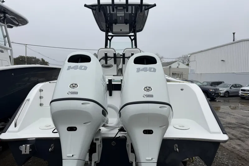 Slide: The Image of 2026 Cape Horn 22 OS boat with dual 140 horsepower outboard engines. - 17