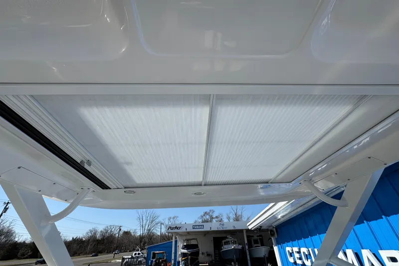 Slide: The Image of 2026 Chaparral 280 OSX boat roof detail at dealership. - 30
