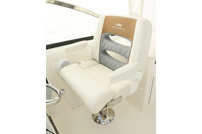 Slide: The Image of Manufacturer Provided Image: 2025 Cobia 280 Dual Console boat seat, luxurious white and tan design. - 10