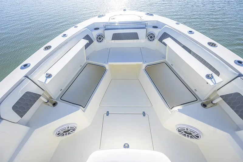 Slide: The Image of Manufacturer Provided Image: 2025 Cobia 265 Center Console boat interior with spacious seating and storage. - 11