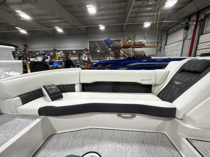 Slide: The Image of Interior of a 2026 Bennington 25RTFB boat in a workshop. - 18