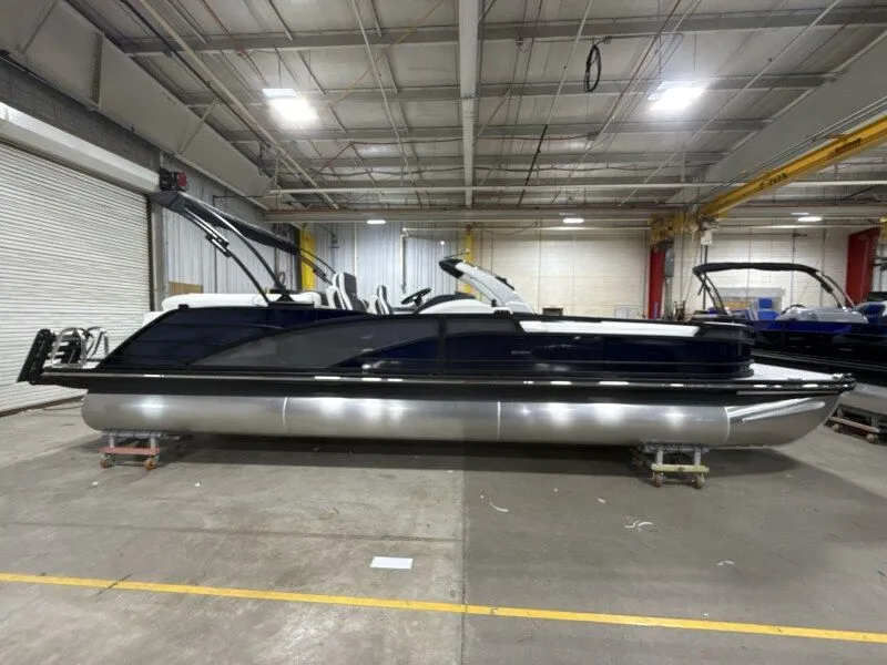 Slide: The Image of Bennington 25RTFB 2026 pontoon boat in warehouse. - 3