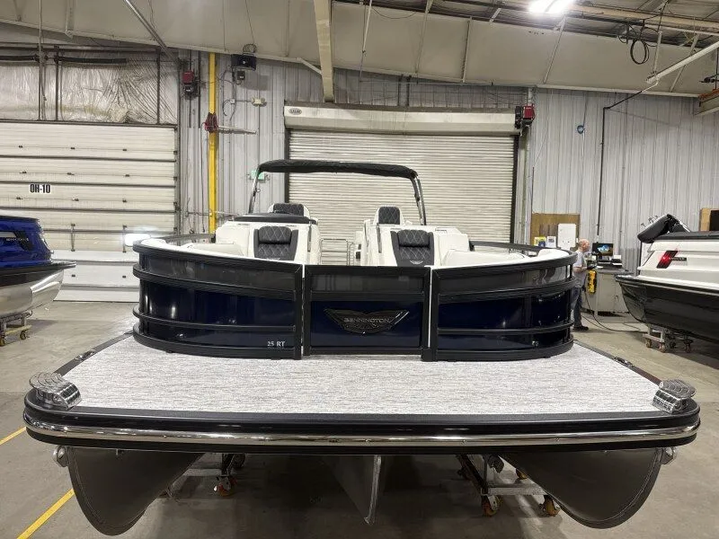 Slide: The Image of 2026 Bennington 25RTFB pontoon boat in warehouse. - 5