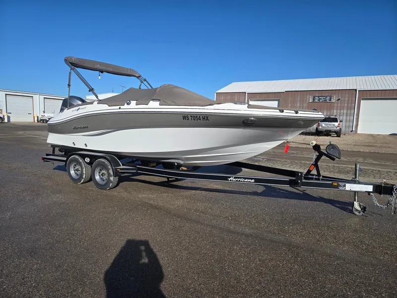The Image of 2013 Hurricane SS203-OB boat on trailer, sunny day. - 1