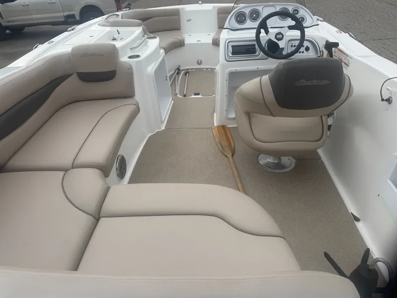Slide: The Image of Interior of a 2013 Hurricane SS203-OB boat with beige seating. - 20