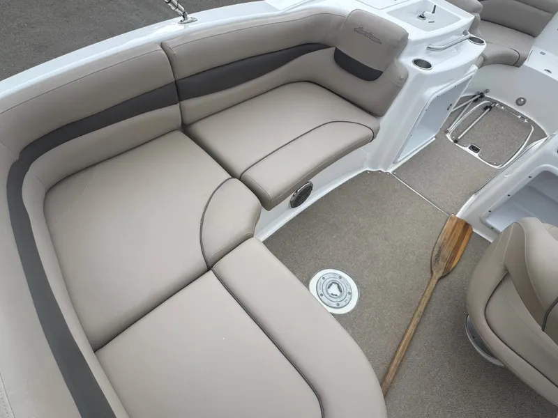 Slide: The Image of Interior of a 2013 Hurricane SS203-OB boat with beige upholstery. - 21