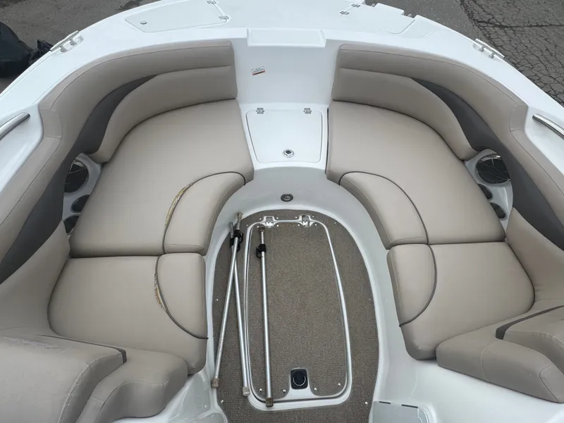 Slide: The Image of Interior of a 2013 Hurricane SS203-OB boat with beige seating. - 28