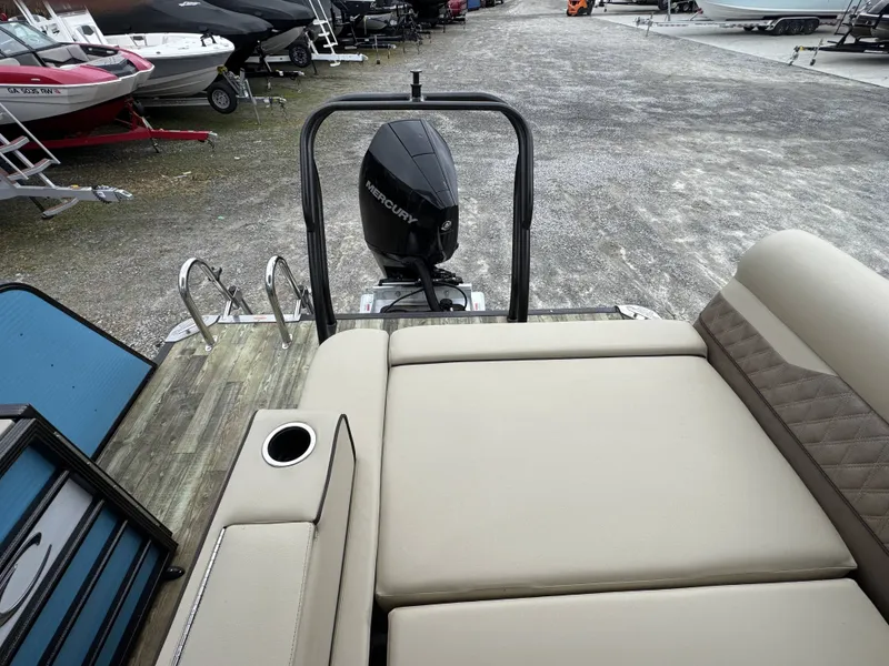 Slide: The Image of Crest 240 Platinum 2020 with Mercury engine, beige upholstery, on boat trailer. - 15