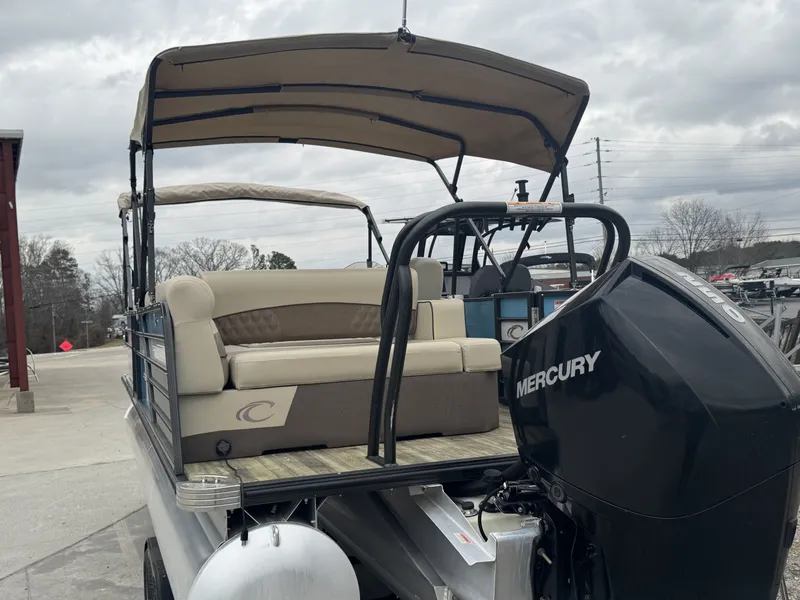 Slide: The Image of 2020 Crest 240 Platinum pontoon boat with Mercury engine, beige seating. - 5
