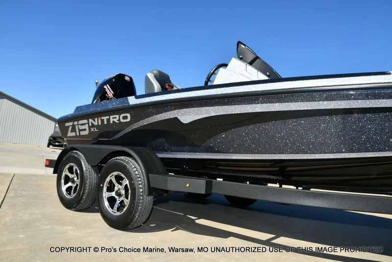 Slide: The Image of 2026 Nitro Z19 XL Pro boat on trailer, glossy black finish. - 17