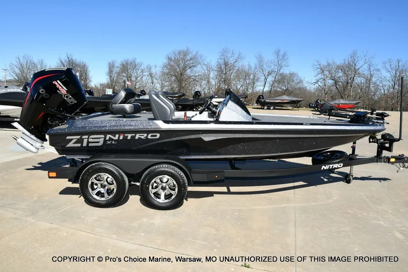 Slide: The Image of 2026 Nitro Z19 XL Pro boat on trailer outdoors. - 19
