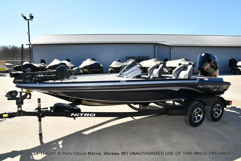 Slide: The Image of 2026 Nitro Z19 XL Pro boat on trailer, side view. - 25
