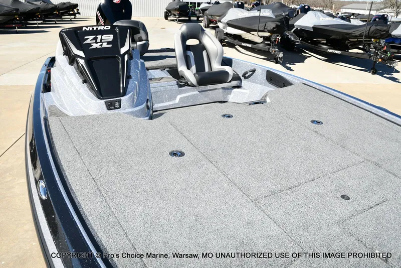 Slide: The Image of 2026 Nitro Z19 XL Pro boat on a parking lot. - 32