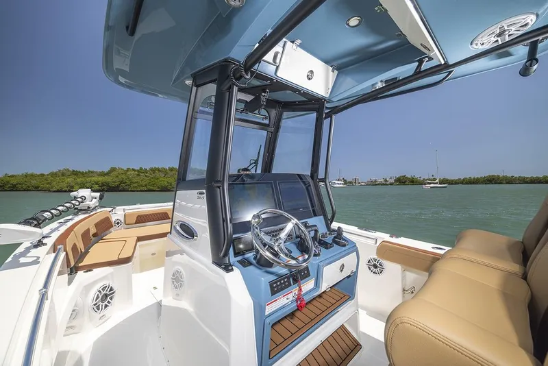 Slide: The Image of Manufacturer Provided Image: 2025 Cobia 265 Center Console Open boat interior with modern helm and seating. - 13