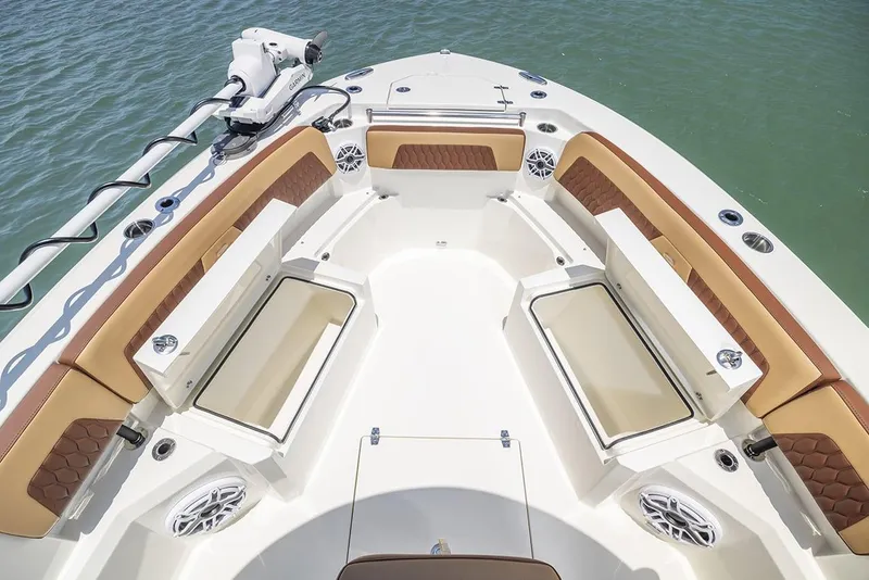 Slide: The Image of Manufacturer Provided Image: 2025 Cobia 265 Center Console Open boat interior with cushioned seating and storage. - 3