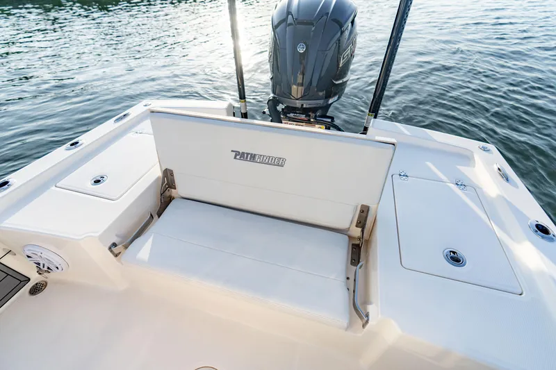 Slide: The Image of Manufacturer Provided Image: 2026 Pathfinder 2200 TRS boat with seating and motor, on calm water. - 18