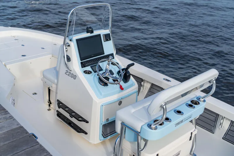 Slide: The Image of Manufacturer Provided Image: 2026 Pathfinder 2200 TRS boat console with steering wheel and navigation system. - 3