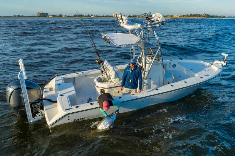 Slide: The Image of Manufacturer Provided Image: 2026 Pathfinder 2400 Open boat on water with two people fishing. - 6