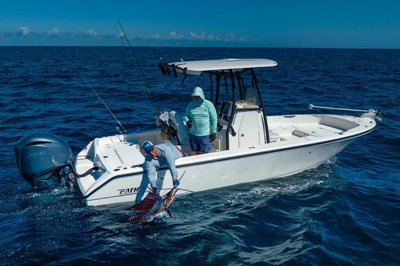 Slide: The Image of Manufacturer Provided Image: 2026 Pathfinder 2400 TRS boat with anglers fishing in open ocean. - 3