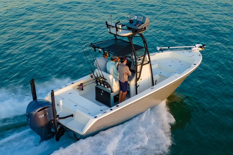 Slide: The Image of Manufacturer Provided Image: 2026 Pathfinder 2400 TRS boat cruising on open water with passengers. - 5