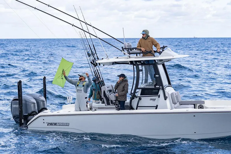 Slide: The Image of Manufacturer Provided Image: 2026 Pathfinder 2800 Hybrid boat with anglers fishing in open ocean. - 2
