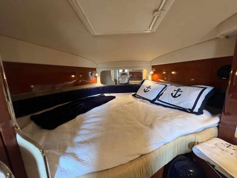 Slide: The Image of Interior of 2001 Sea Ray 340 Amberjack with cozy bed. - 21