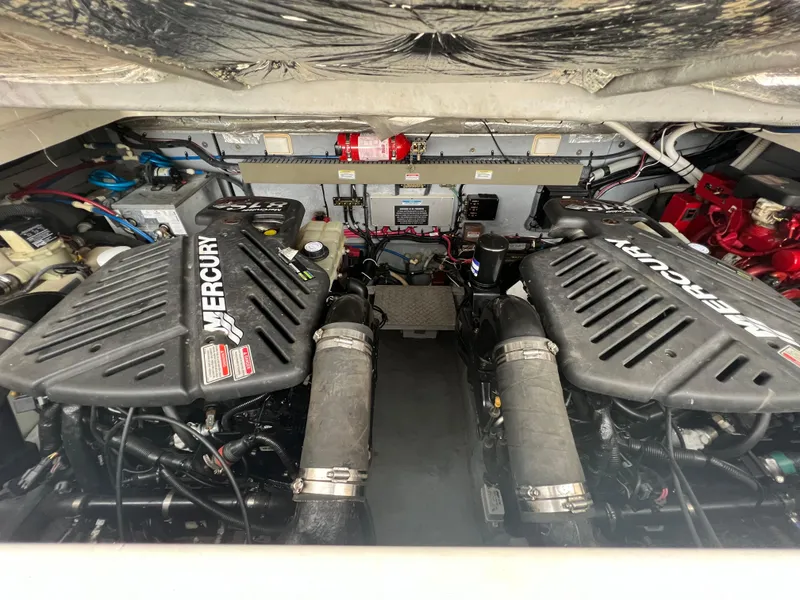 Slide: The Image of Engine room of 2001 Sea Ray 340 Amberjack with Mercury engines. - 25