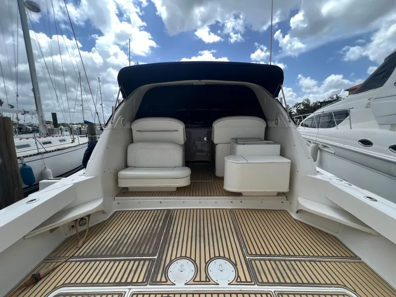 Slide: The Image of Aft view of 2001 Sea Ray 340 Amberjack in marina. - 5