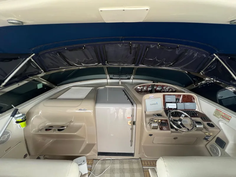 Slide: The Image of Cockpit of 2001 Sea Ray 340 Amberjack with controls and instruments. - 6