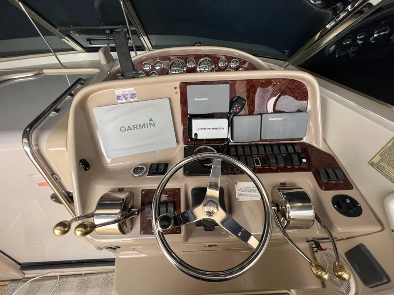 Slide: The Image of Sea Ray 340 Amberjack 2001 helm with Garmin navigation system. - 8