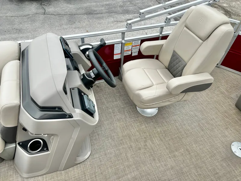 Slide: The Image of Interior of 2024 Sun Tracker 20' PARTY BARGE DLX with steering wheel and seat. - 13