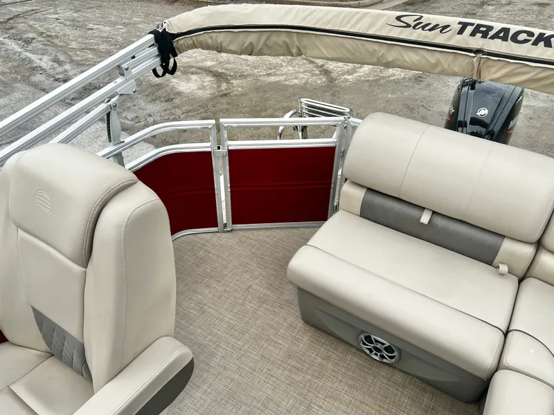 Slide: The Image of Interior of 2024 Sun Tracker 20' PARTY BARGE DLX with beige seating. - 15