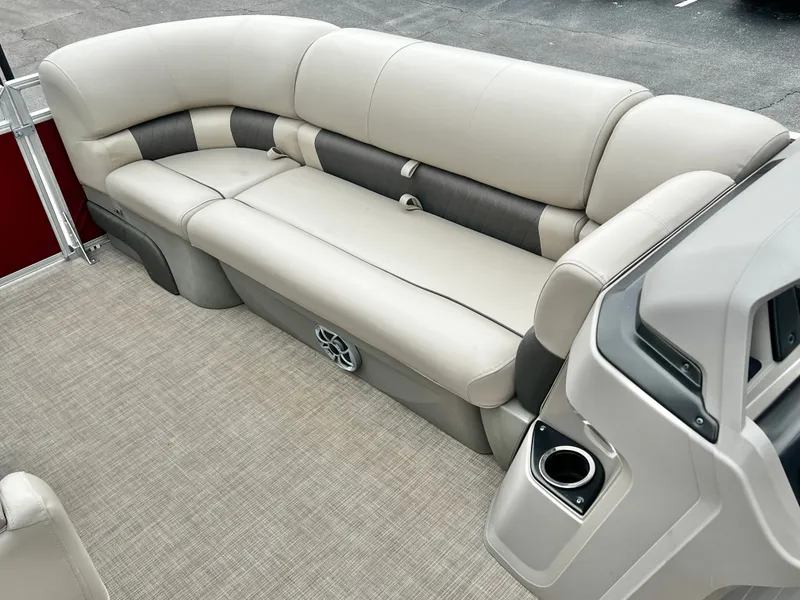 Slide: The Image of Interior of 2024 Sun Tracker 20' PARTY BARGE DLX with beige sofa. - 24