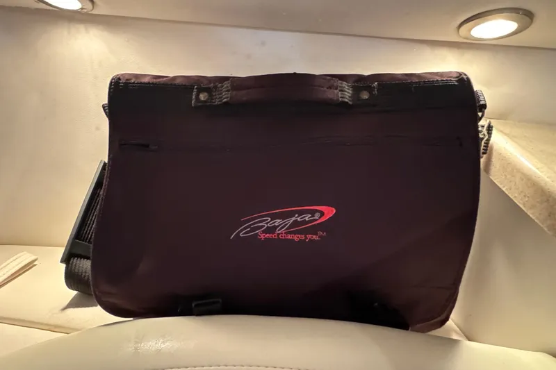 Slide: The Image of Black Baja bag with logo, "Speed changes you," on a light background. - 26