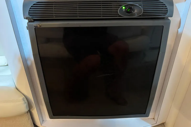 Slide: The Image of 2002 Baja .38 Special boat refrigerator with black door and control panel. - 27