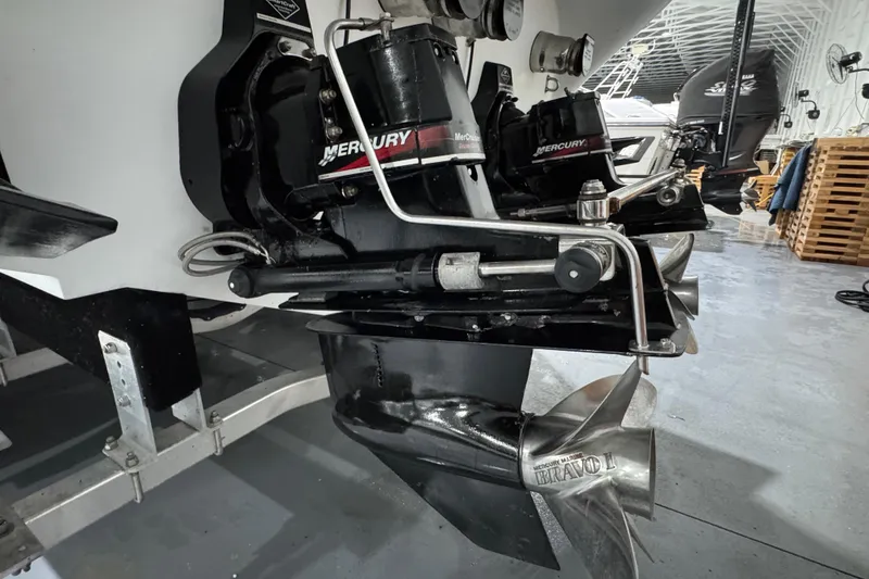 Slide: The Image of Close-up of a 2002 Baja .38 Special boat's Mercury Bravo III outdrive in a garage. - 8