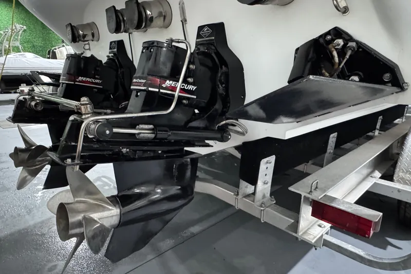 Slide: The Image of 2002 Baja .38 Special boat with dual Mercury outboard engines and stainless steel propellers. - 9