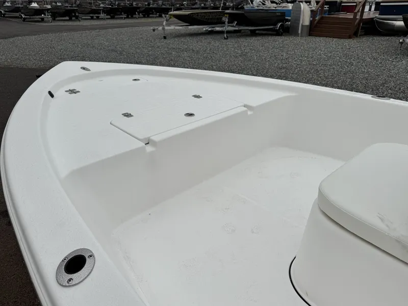 Slide: The Image of 2026 Sea Pro 172 Bay boat, front deck view at marina. - 3