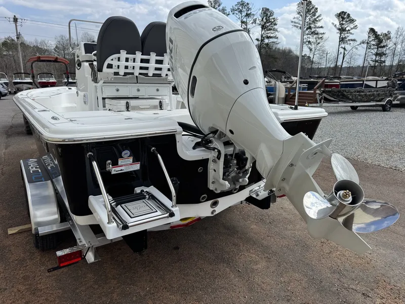 Slide: The Image of Rear view of a 2026 Sea Pro 230 Bay boat with outboard motor. - 7