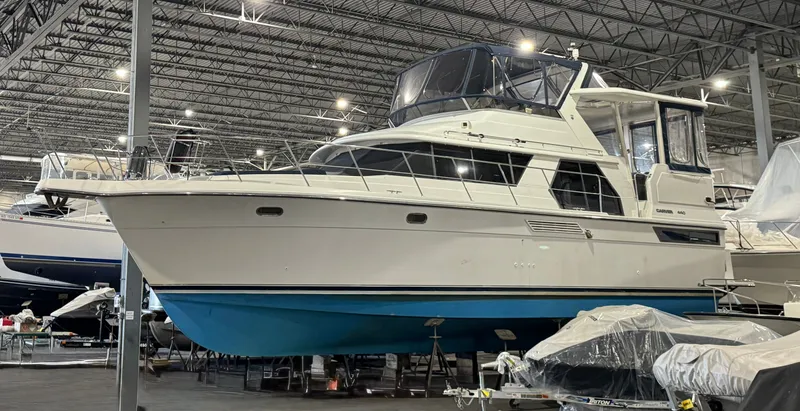 Slide: The Image of 1994 Carver 440 Aft Cabin Motor Yacht in storage facility. - 29