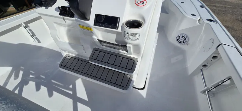 Slide: The Image of Interior view of 2026 Tidewater 2110BMT boat with control console. - 13