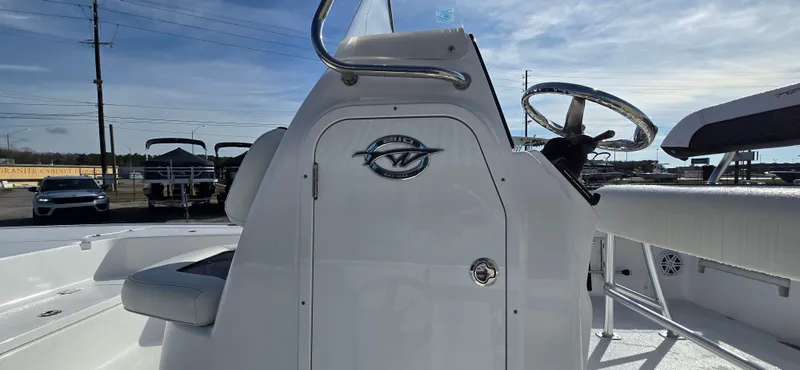 Slide: The Image of 2026 Tidewater 2110BMT boat cockpit with helm station. - 8