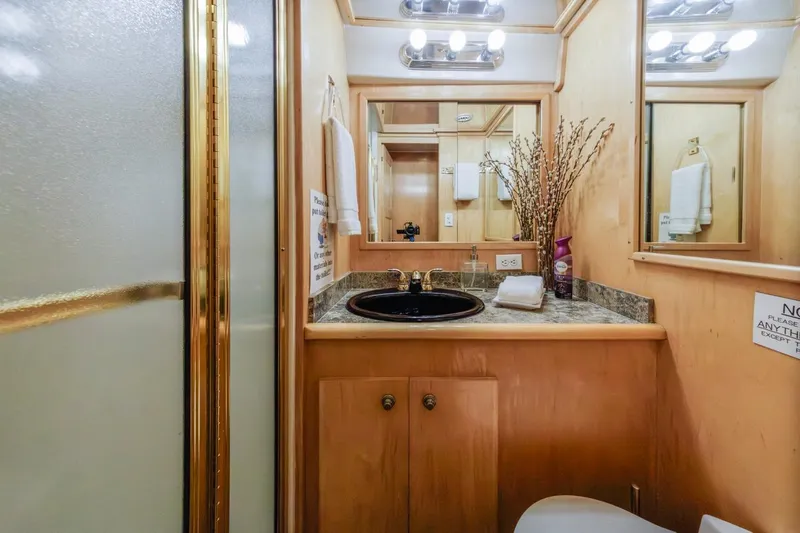 Slide: The Image of Bathroom interior of 1996 Navigator 5300 Classic yacht with elegant fixtures and decor. - 37