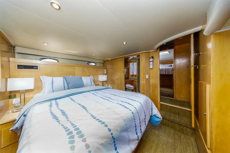 Slide: The Image of Luxurious bedroom interior of 1996 Navigator 5300 Classic yacht with modern decor. - 39