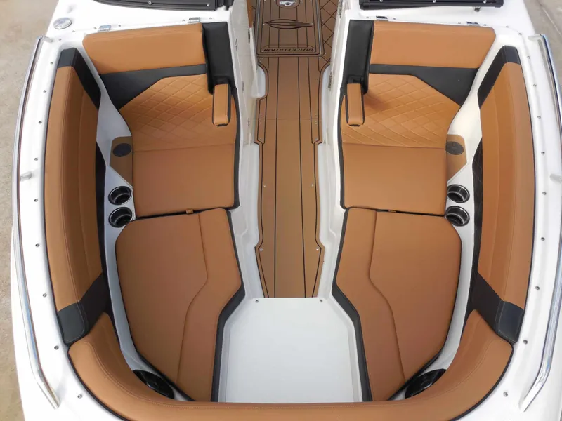 Slide: The Image of Interior of a 2026 Chaparral GTS 6 with brown and black seating. - 25
