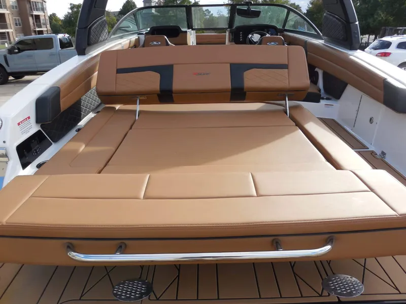 Slide: The Image of The image shows the cockpit of a 2026 Chaparral GTS 6 with brown upholstery. - 17
