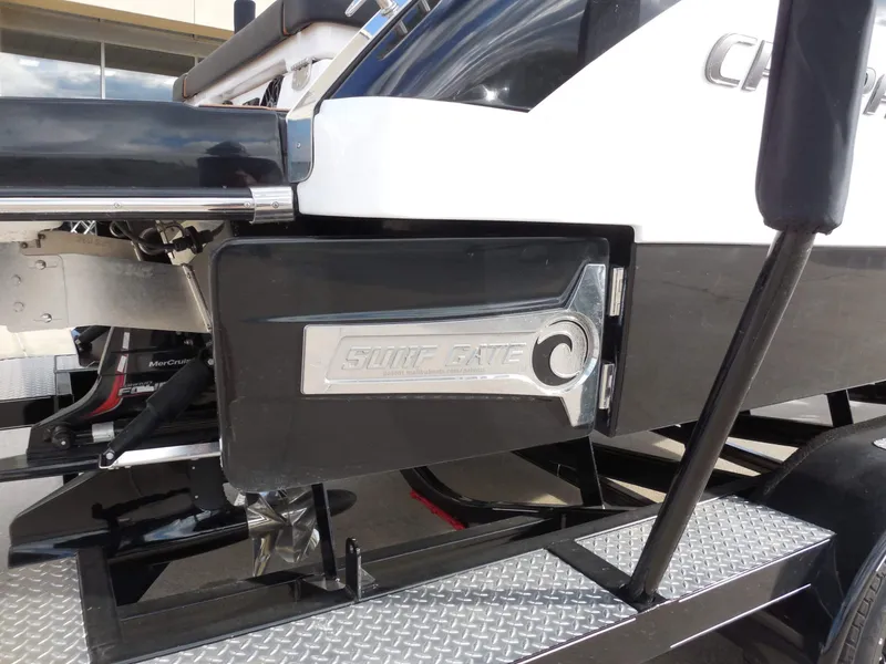 Slide: The Image of Close-up of the stern of a Chaparral GTS 6 boat featuring a "Surf Gate" system. - 12