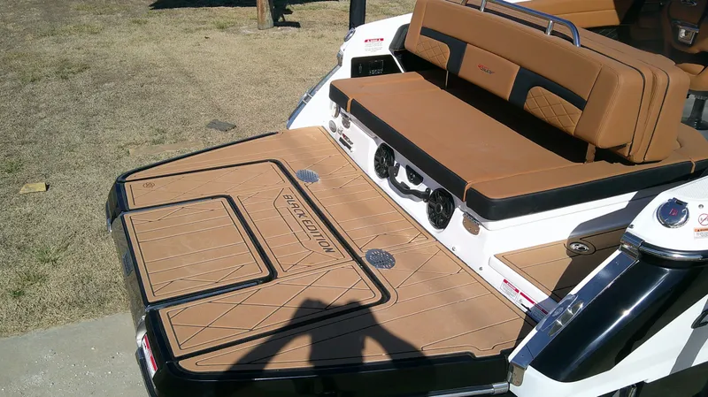 Slide: The Image of Chaparral GTS 6 2026 boat rear with brown upholstery. - 9