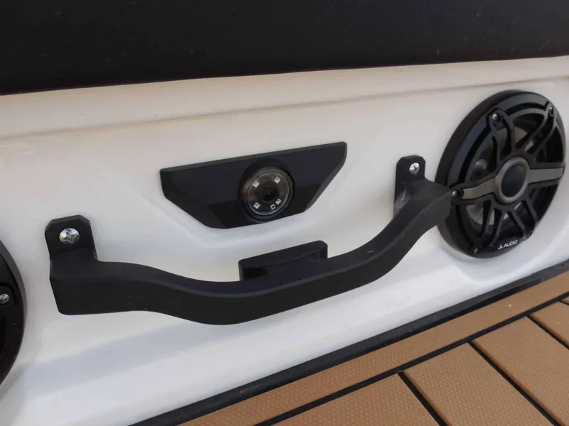 Slide: The Image of Close-up of a speaker and camera on a boat, surrounded by sleek design. - 16
